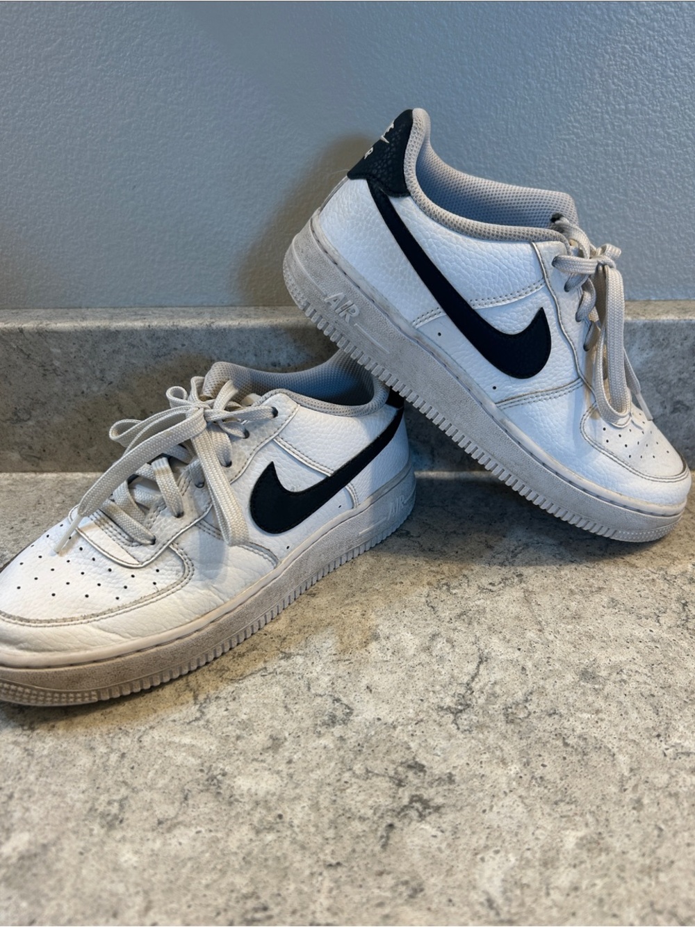 Nike White Sneakers with Black Swoosh Low-Top